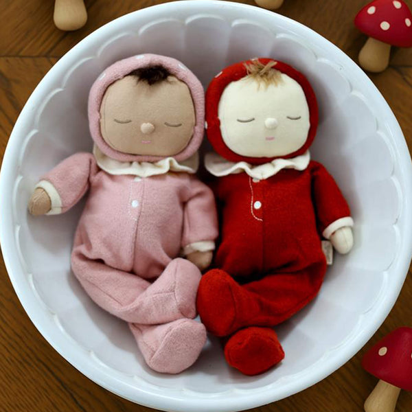 Dozy Dinkums - Toadstool Moppet red soft doll in a hood and frilled collar beside a pink soft doll in a white scalloped bowl