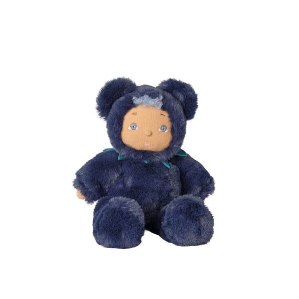 A plush teddy bear doll wearing a dark navy blue hooded outfit with a small teal bow, set against a plain white background.