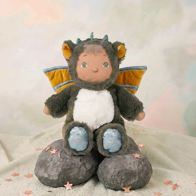 Cozy Day Dinkums Cozy Day Dinkum - Flint soft dragon doll seated on rocks with yellow wings and glittery blue feet