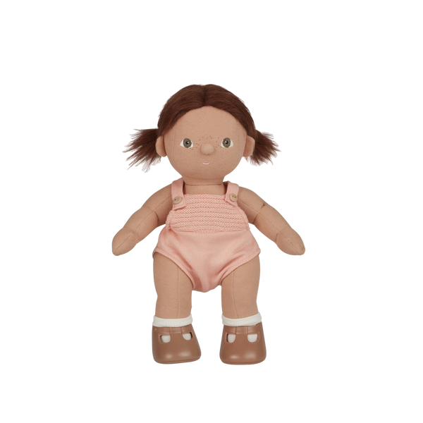 Dinkum Dolls - Dottie soft doll with brown pigtails wearing a pink textured romper and brown shoes designed for imaginative cuddles and play