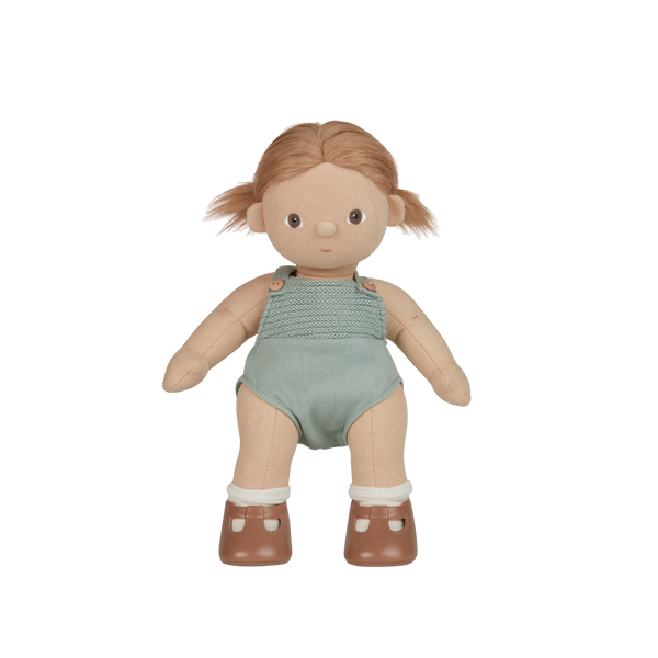 Dinkum Dolls - Gigi soft doll with golden hair wearing a sage green romper and brown shoes for imaginative play