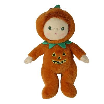 A plush doll dressed in an orange pumpkin costume with a green collar and embroidered jack-o'-lantern face on the front, isolated on a white background.