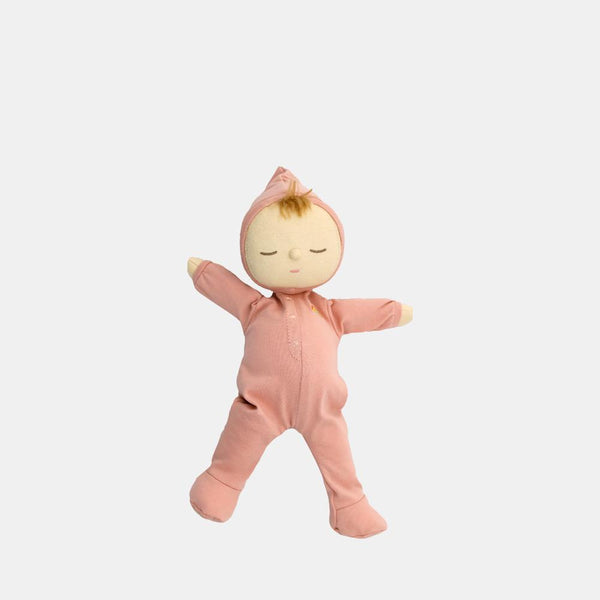 Dozy Dinkums - Moppet soft baby doll in a peach pink sleepsuit with a tied topknot and outstretched arms for cuddly imaginative play