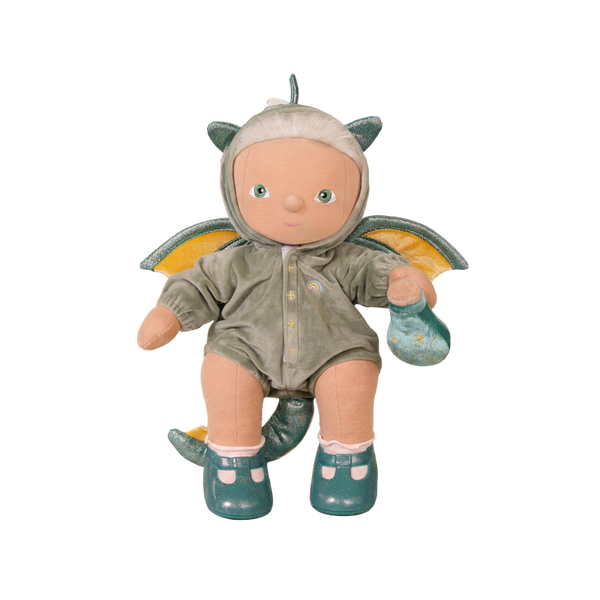 Doll in a dragon costume with wings on a white background