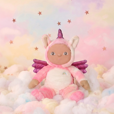 Dinky Dinkum - Yuna Unicorn soft doll by Dinky Dinkums in a pink unicorn costume with wings and rainbow detail sitting among pastel clouds