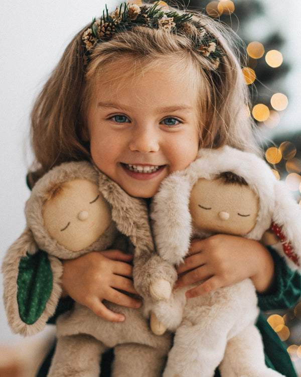 Olli Ella Christmas themed Cozy Dinkum Bunnys together red and green themed features with girl