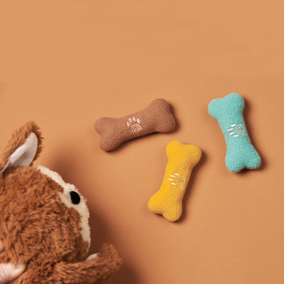 Dog bone toys with magnetic element to atatch to our dinkum dog soft plush toys for imaginitve play.