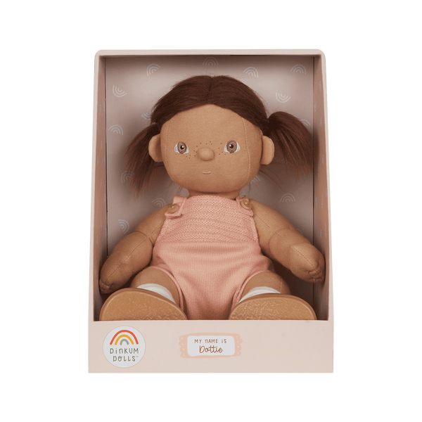 Dinkum Dolls - Dottie soft doll with brown hair and pink outfit displayed in a gift box, ready for imaginative play