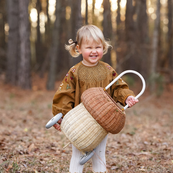 100% handwoven mushroom basket on wheels. This basket maked a beautiful addition to any woodland-themed nursery or bedroom or for transporting dolls, toys and trinkets.
