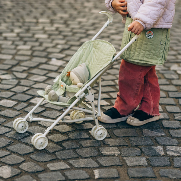 Olli Ella sage green doll pram for kids toys. For use with our posable dinkum dolls and matching changing bag and mat for imaginative doll play.