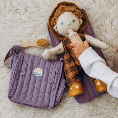 Carrie Convertible Changing Set - Lavender by Dinkum Dolls with a soft doll, quilted changing bag, changing mat and hairbrush for imaginative play