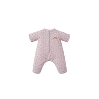 Pink baby onesie with rainbow design on a white background