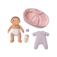 Baby doll with diaper, hat, and onesie on a white background