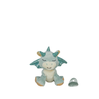 Plush dragon toy with green wings on a white background