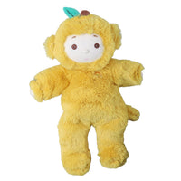 A yellow plush toy character with a white face, brown eyes, and a small green leaf on its head, isolated on a white background.