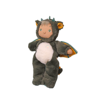 Plush toy resembling a dragon with a soft texture on a transparent background
