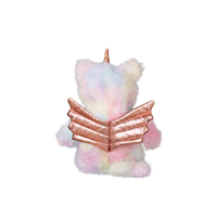 Plush toy unicorn with rainbow-colored body and rose gold wings on a white background