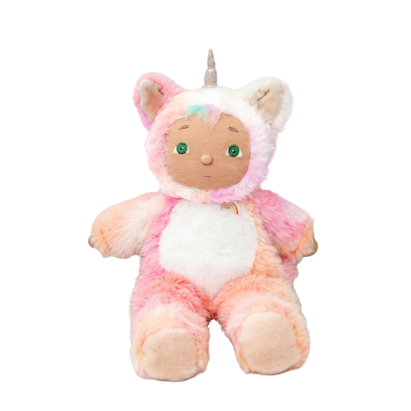 Cozy Day Dinkum - Kittycorn Pompom by Cozy Day Dinkums is a soft pink and white plush kittycorn doll with a horn and cuddly rounded ears.