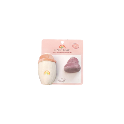 Baby pacifier and bottle set packaging with rainbow design on a white background