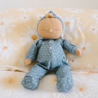 Gender-neutral posable plush doll with blue velvety onsie outfit. Perfectly weighted for cuddles and bedtime. Suitable toy from birth.