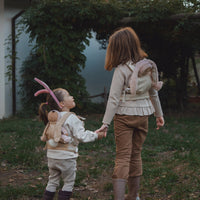 This flower printed doll carrier features adjustable straps and a snug fit, ideal for kids to carry their dolls comfortably.The perfect doll accessory for kids imaginative play.
