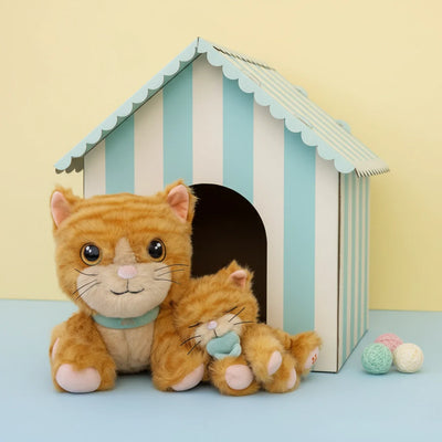 Dinkum Cat Binx - Ginger soft plush ginger cat toy with a smaller kitten companion beside a striped playhouse and colourful yarn balls