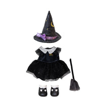 A children's Halloween outfit set on a plain white background, including a black glittery witch hat with a purple bow and gold moon detail, a black dress with a white ruffled collar and small gold accent, black shoes with white trim, and a black broom.