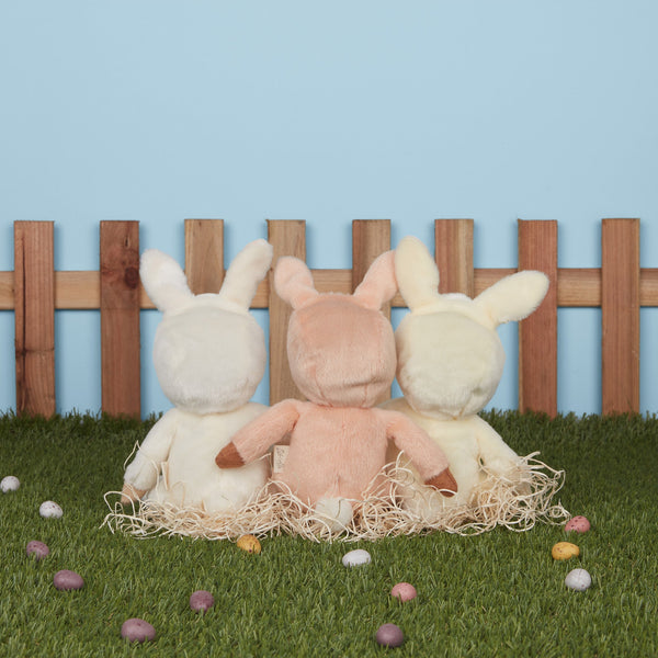 A soft, cuddly plush bunny toy with a yellow-colored coat, perfect for small hands and imaginative play. Perfectly weighted and collectable easter-themed plush toy.