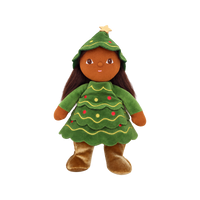 Plush doll with long dark brown hair and embroidered brown eyes, dressed as a Christmas tree in a green tiered, scalloped dress with gold wavy stitching and red and yellow bauble dots, a matching hood topped with a gold star, and gold velvet boots.