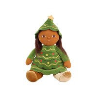 Plush doll with long dark brown hair and embroidered brown eyes, dressed as a Christmas tree in a green tiered, scalloped dress with gold wavy stitching and red and yellow bauble dots, a matching hood topped with a gold star, and gold velvet boots.
