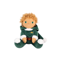 Plush doll with curly golden hair and embroidered green eyes, dressed as a Christmas elf in a dark green velvet suit and pointed hat with white fluffy trim, a brown belt, and a small rainbow patch on the chest.