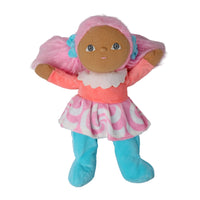 A plush doll with brown fabric skin, pink hair, a pink and white patterned dress, and blue tights, shown against a plain white background.