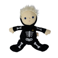 A plush doll wearing a black skeleton costume with white bone embroidery, a beige face and hands, and spiky white hair, photographed on a plain white background.