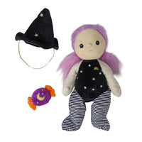 A plush doll with long pink hair, a black witch hat with silver stars, and a small purple moon-and-star accessory, all shown on a plain white background.