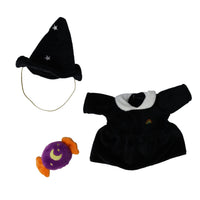 A three-piece plush pet costume set featuring a black velvet witch hat with white embroidered stars and a gold chin strap, a black velvet dress with a white faux-fur collar and a small rainbow detail, and a purple plush moon accessory with orange wings.