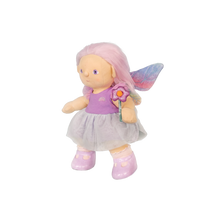 Plush fairy doll with pink hair, purple dress, and fairy wings on a white background