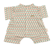 Cream short-sleeved doll romper with a small red and green sprig print, a front placket, short legs, and a small gold embroidered rainbow on the chest.