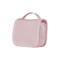 Compact, durable kids pink toiletry bag by Olli Ella. Perfect for toiletries and travel essentials. Ideal for organized packing, made from eco-friendly materials.