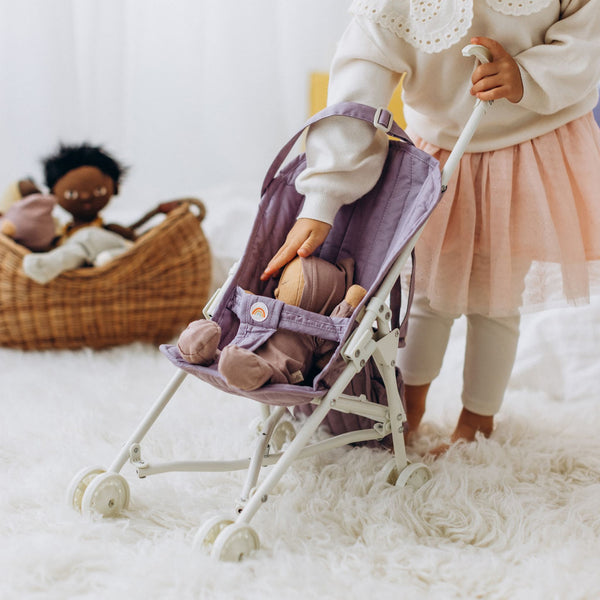 Olli Ella purple doll pram for imaginative doll play.