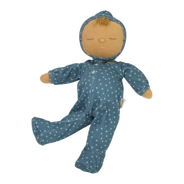 Dozy Dinkum doll with blue velvety onsie outfit. Perfectly weighted doll for calm. Plush doll with blonde hair, perfect for cuddling and interactive doll play.
