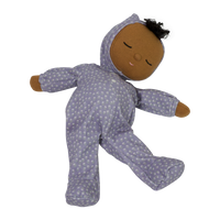 Dozy Dinkum doll with purple velvety onsie outfit. Perfectly weighted doll for calm. Plush doll with brown hair, perfect for cuddling and interactive doll play.