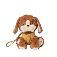 Posable soft plush dog toy with movable head and body parts.