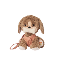 Posable soft plush dog toy with movable head and body parts.