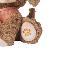 Plush dog toy with super soft fabric and velvety ears. Perfect for kids play and snuggles.