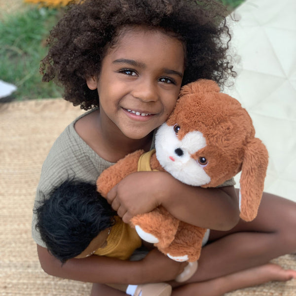 Plush dog toy with super soft fabric and velvety ears. Perfect for kids play and snuggles.
