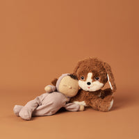 Posable soft plush dog toy with movable head and body parts.