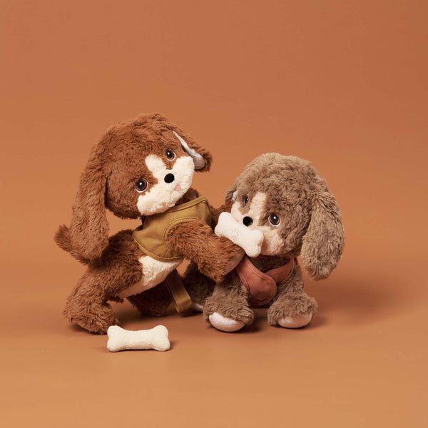 Plush dog toy with super soft fabric and velvety ears. Perfect for kids play and snuggles.