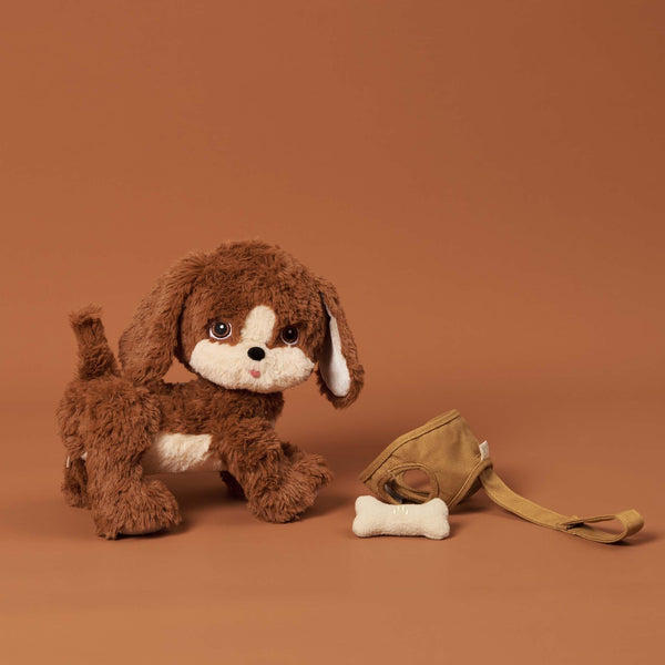 Plush dog toy with super soft fabric and velvety ears. Perfect for kids play and snuggles.