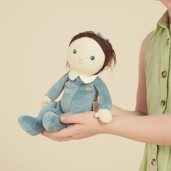 A limited-edition palm-sized plush toy, perfectly weighted in all the right places, and outfitted in a snuggly plush velvety blueberry suit.