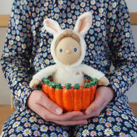A soft, cuddly plush bunny toy with an ivory-colored coat, perfect for small hands and imaginative play. Perfectly weighted and collectable easter-themed plush toy.